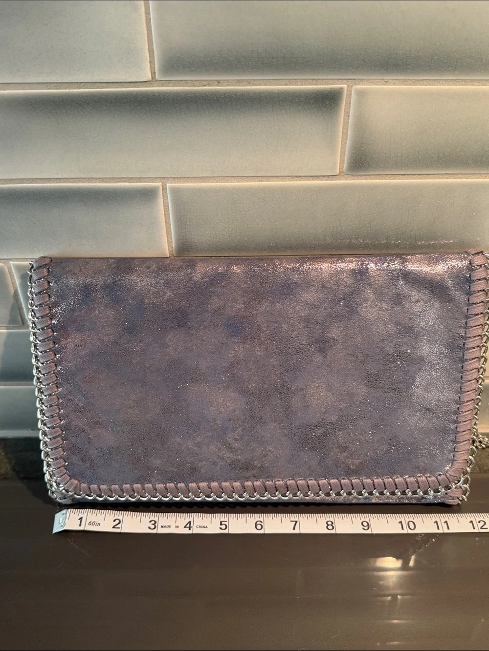 Phaser Purplish Gray Metallic Leather Crossbody Clutch with Chain Trim